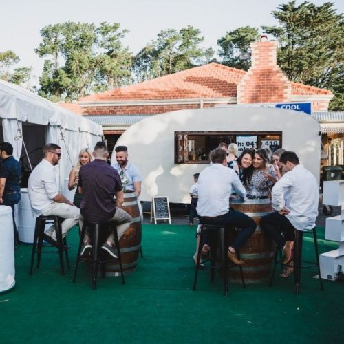 rustic wedding with wine barrels and stools