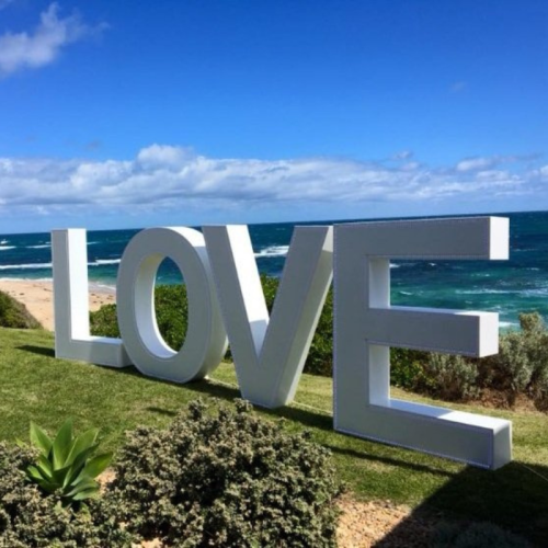 large light up LOVE on beach