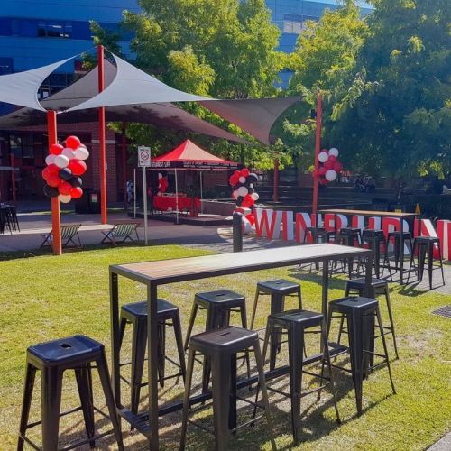 high bar bench tables with bar stools outside