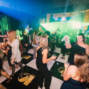 black and white dancefloor and dancing guests