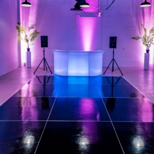 black dancefloor pink and blue lighting