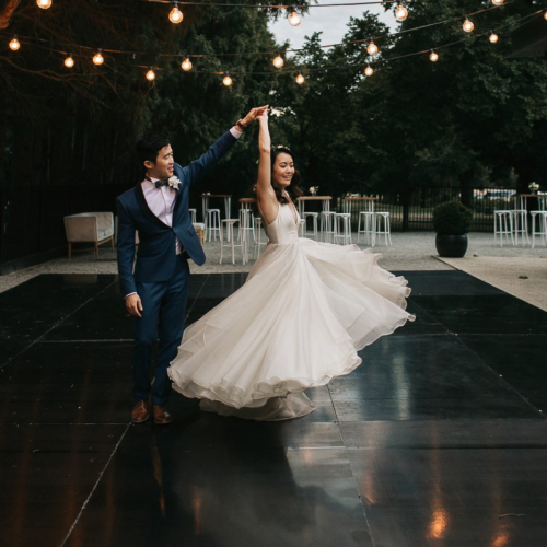 black outdoor dancefloor at wedding