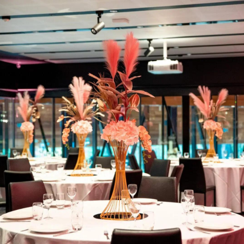 dusty pink table centrepieces dining setting